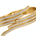 Close-up of sparkling pave stone rows on gold crossover bangle - Avenzra Gold Crossover Stone Bangle