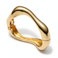High-shine gold wavy hinged bangle close-up - Avenzra Gold Wavy Bangle