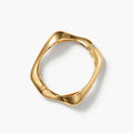 Polished gold wavy hinged cuff bangle top view - Avenzra Gold Wavy Bangle