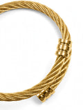 Close-up of golden twisted cable cuff bangle end caps - Avenzra Golden Unisex Cuff Bangle