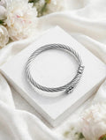 Silver twisted cable cuff bangle on white gift box - Avenzra Twisted Cable Bangle for Men & Women