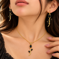 Model wearing black stone tulip pendant necklace and drop earrings - Avenzra Tulip Jewellery Set