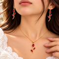 Model wearing red tulip pendant necklace and drop earrings - Avenzra Tulip Jewellery Set
