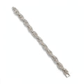 Silver twisted stone bracelet on white background - Avenzra Twisted Stone Bracelet